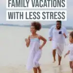 A family running down the beach on vacation.