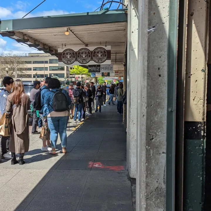 The line outside of starbucks in pike place market.