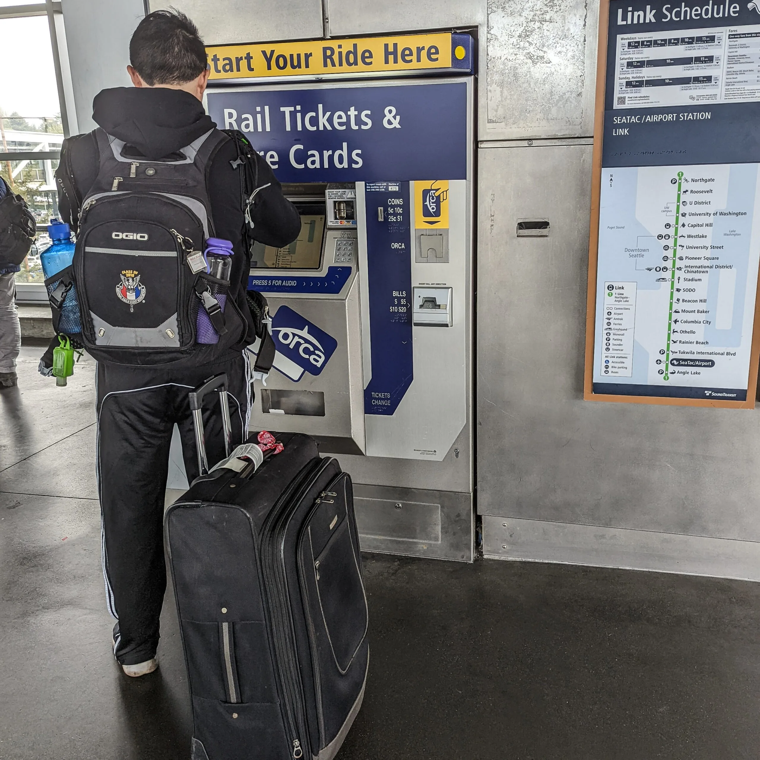 Images of a ticket vending machine at the light rail station at seattle's seatac airport.