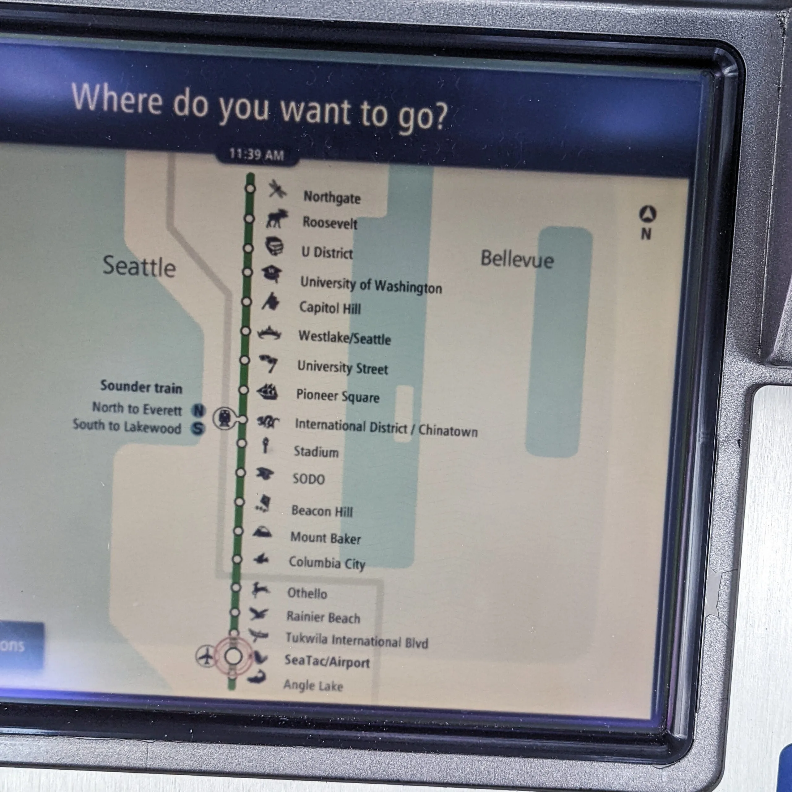 Images of a ticket vending machine at the light rail station at seattle's seatac airport.