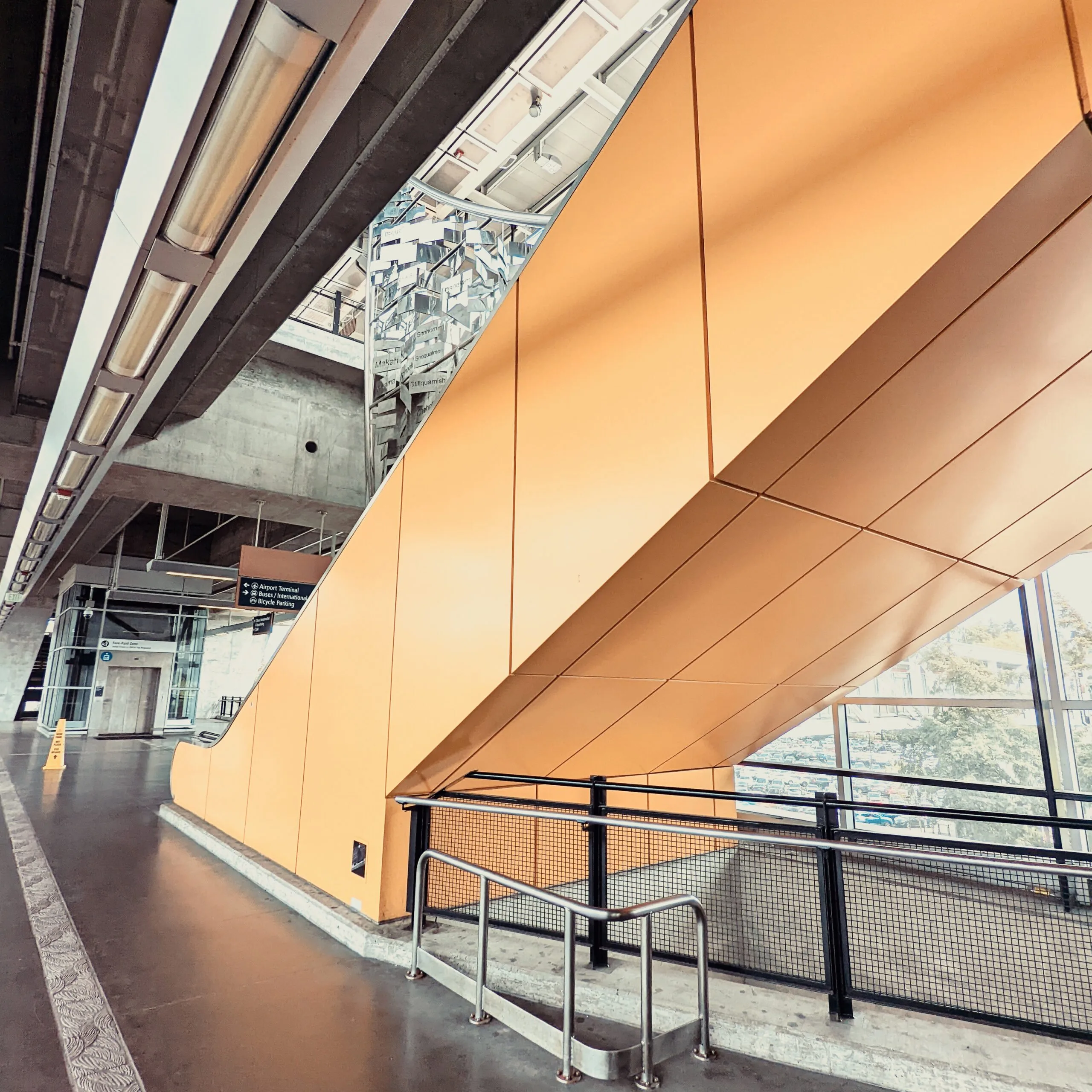 The open, airy cord or of the seatac light rail stations downstairs.