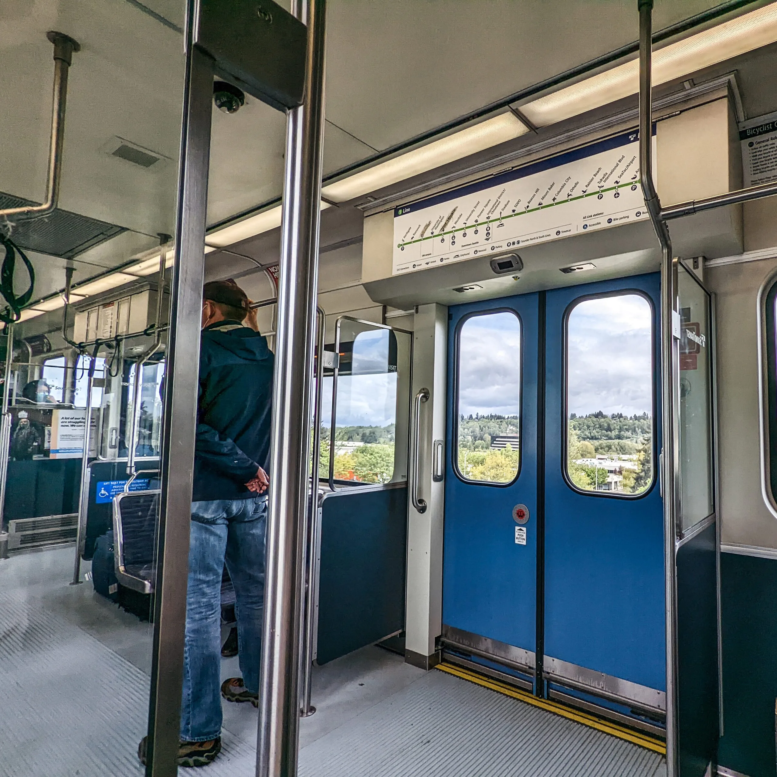 Seattle's light rail train crossing over a pacific northwest landscape south of seattle.