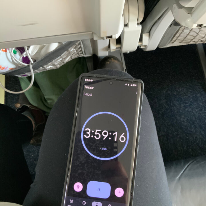 A timer on a phone that's mid-flight, counting down time left in the flight.