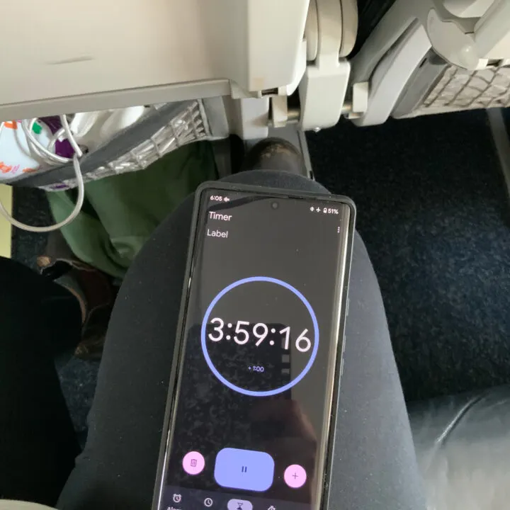 A timer on a phone that's mid-flight, counting down time left in the flight.