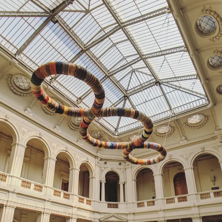 Art displayed on the ceiling of a government building in santiago chile.