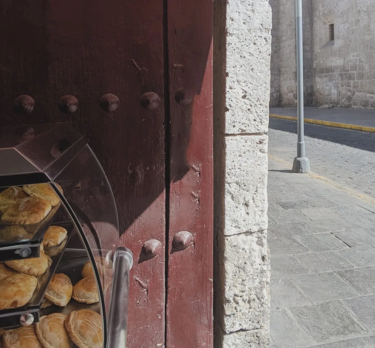 Empanadas in a window in chile.