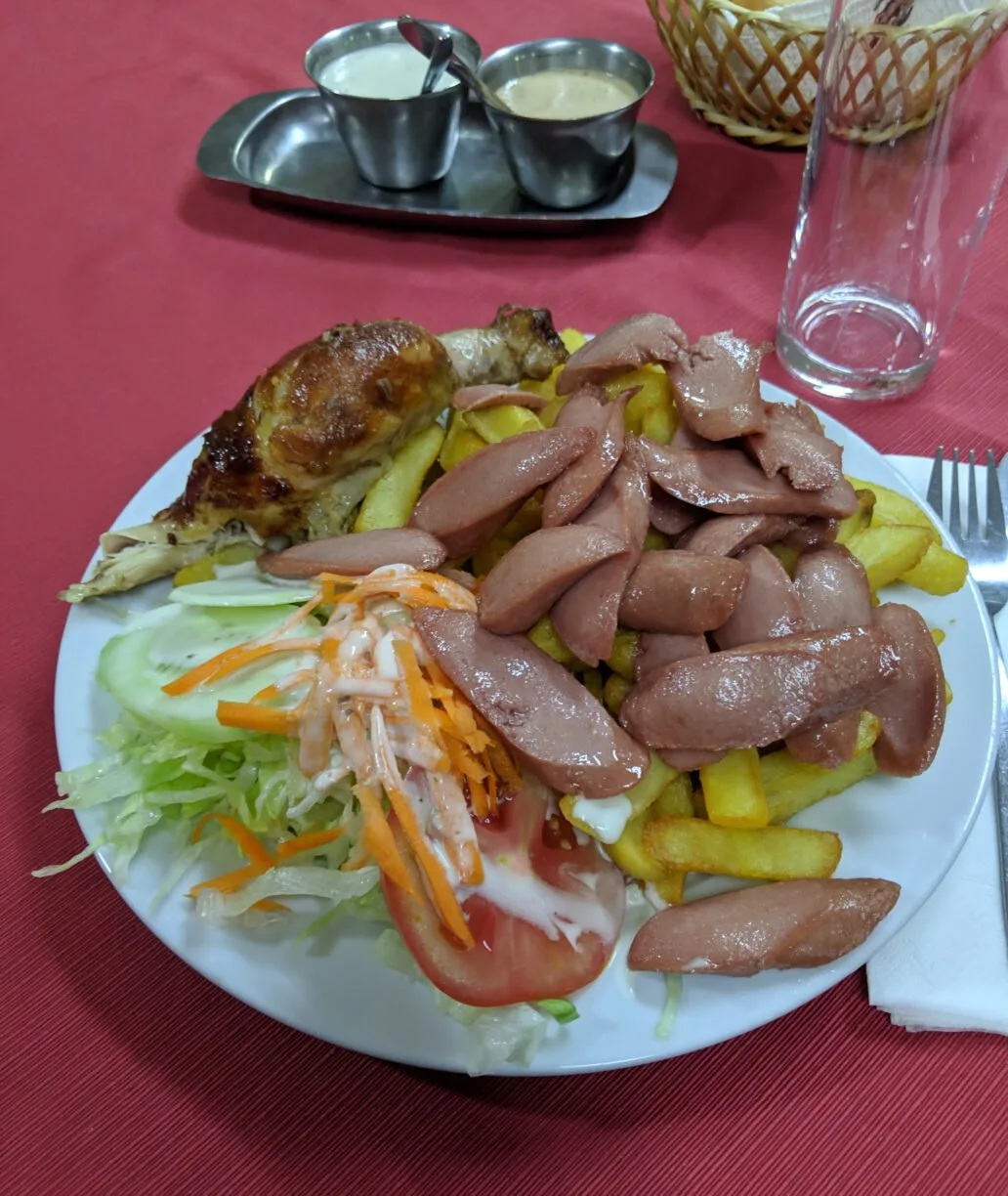 Hot dogs and french fries served in a restaurant in chile