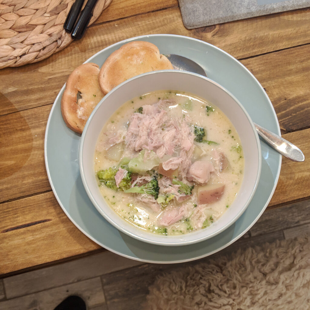 Soup in a bowl with toast.