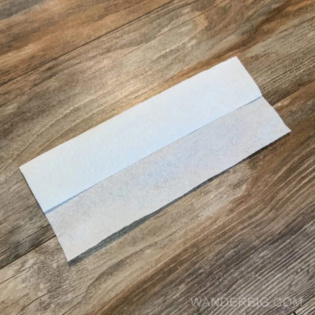 A paper towel folded once lengthwise