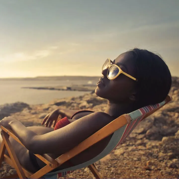 woman relaxing on a beach chair