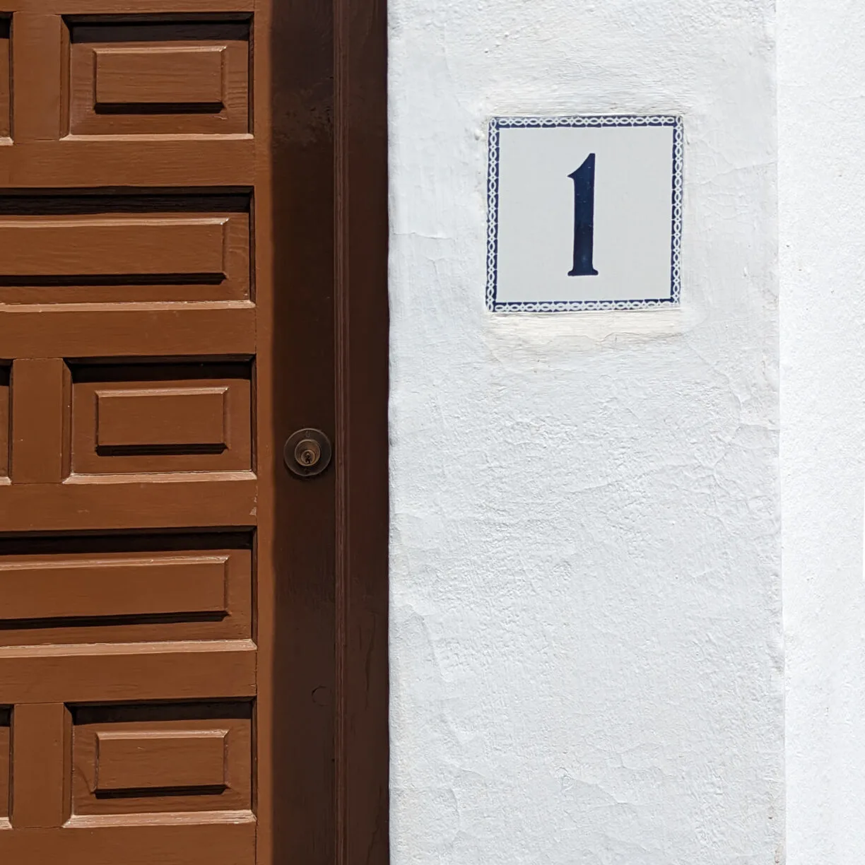 The door to an airbnb apartment in frigiliana spain