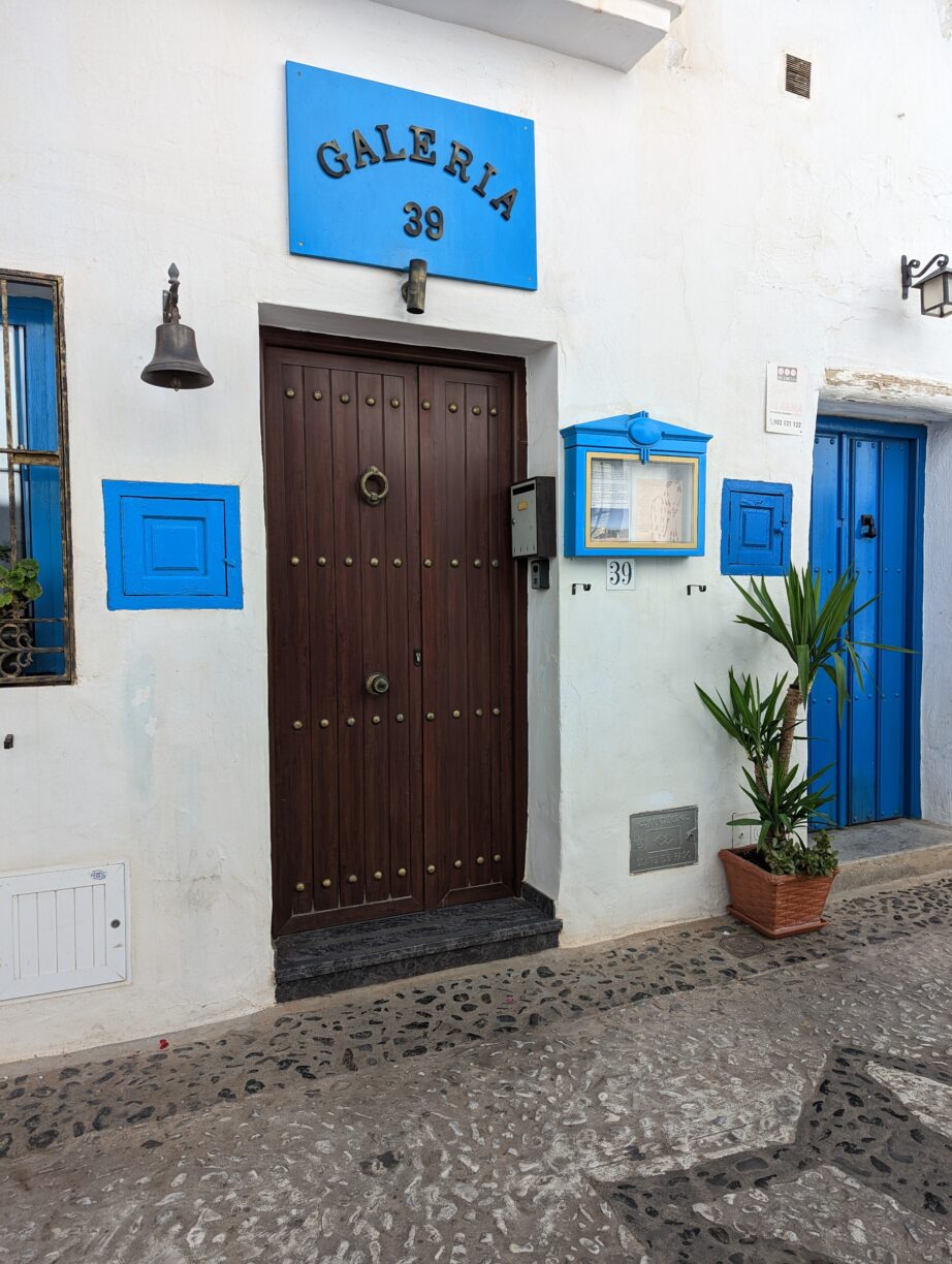 The door to an airbnb apartment in frigiliana spain