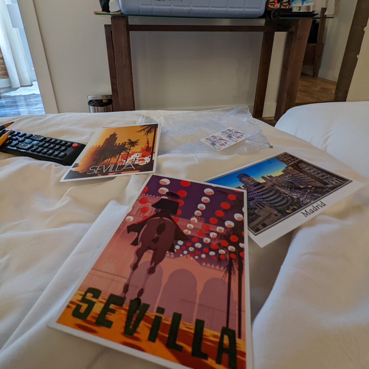 Partially completed postcards t mail home from travel abroad.