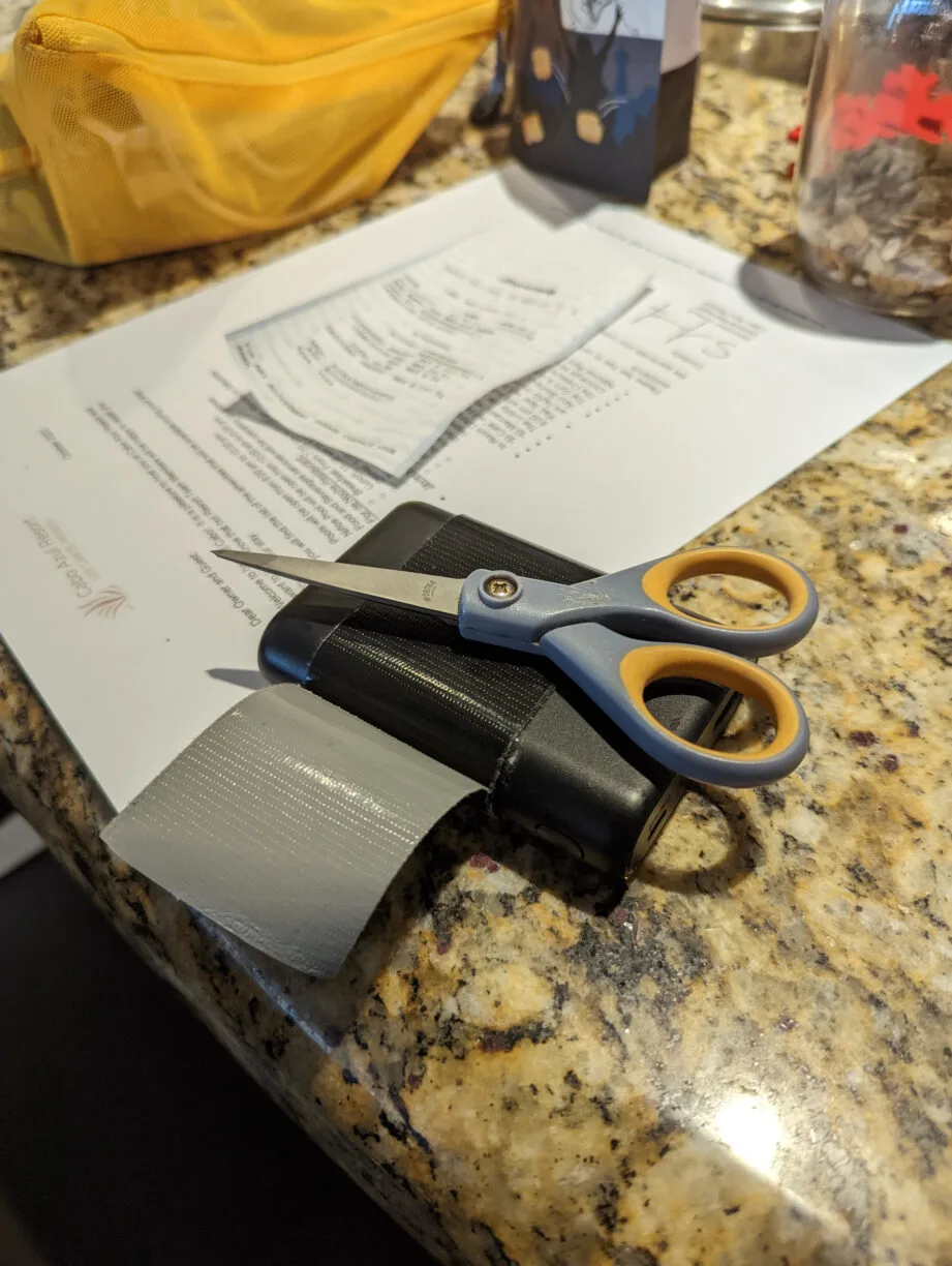 Duct tape wrapped around a power bank is a discrete and space-saving way to always keep a little duct tape handy.