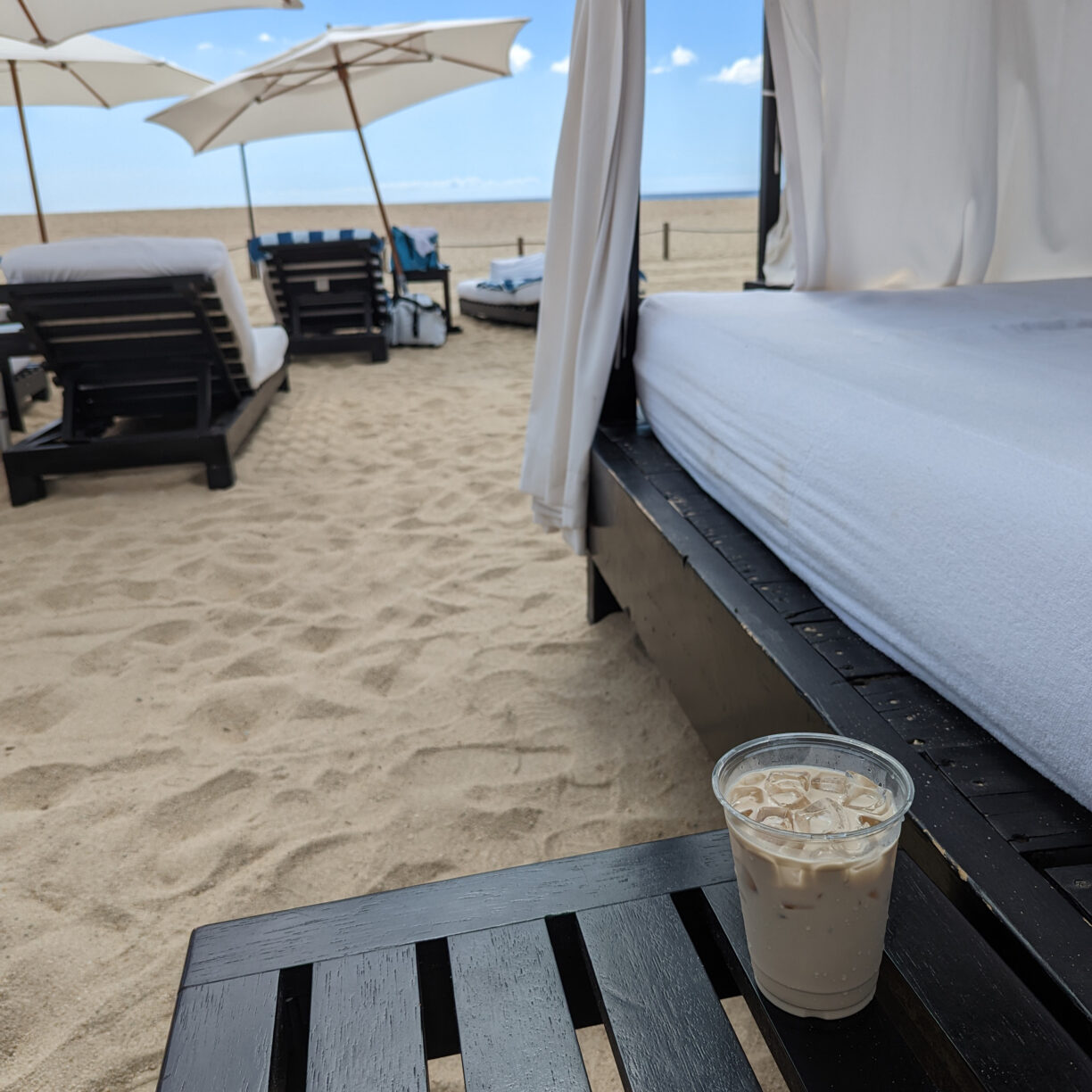 An iced coffee martini in a beach friendly resort cup.