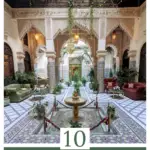 An image of a hotel lobby riad in morocco with the text 10 things to know before booking morocco with intrepid travel.