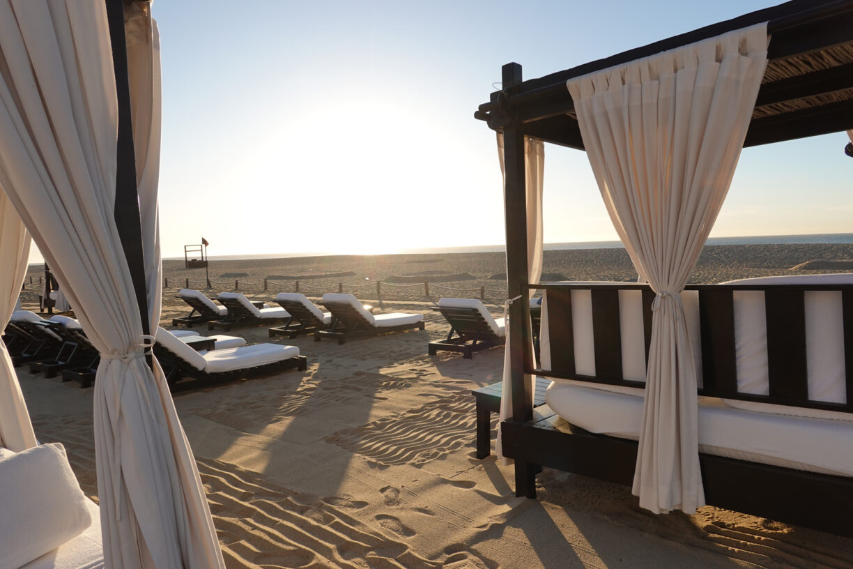 Cabanas on a mexican beach at sunrise.
