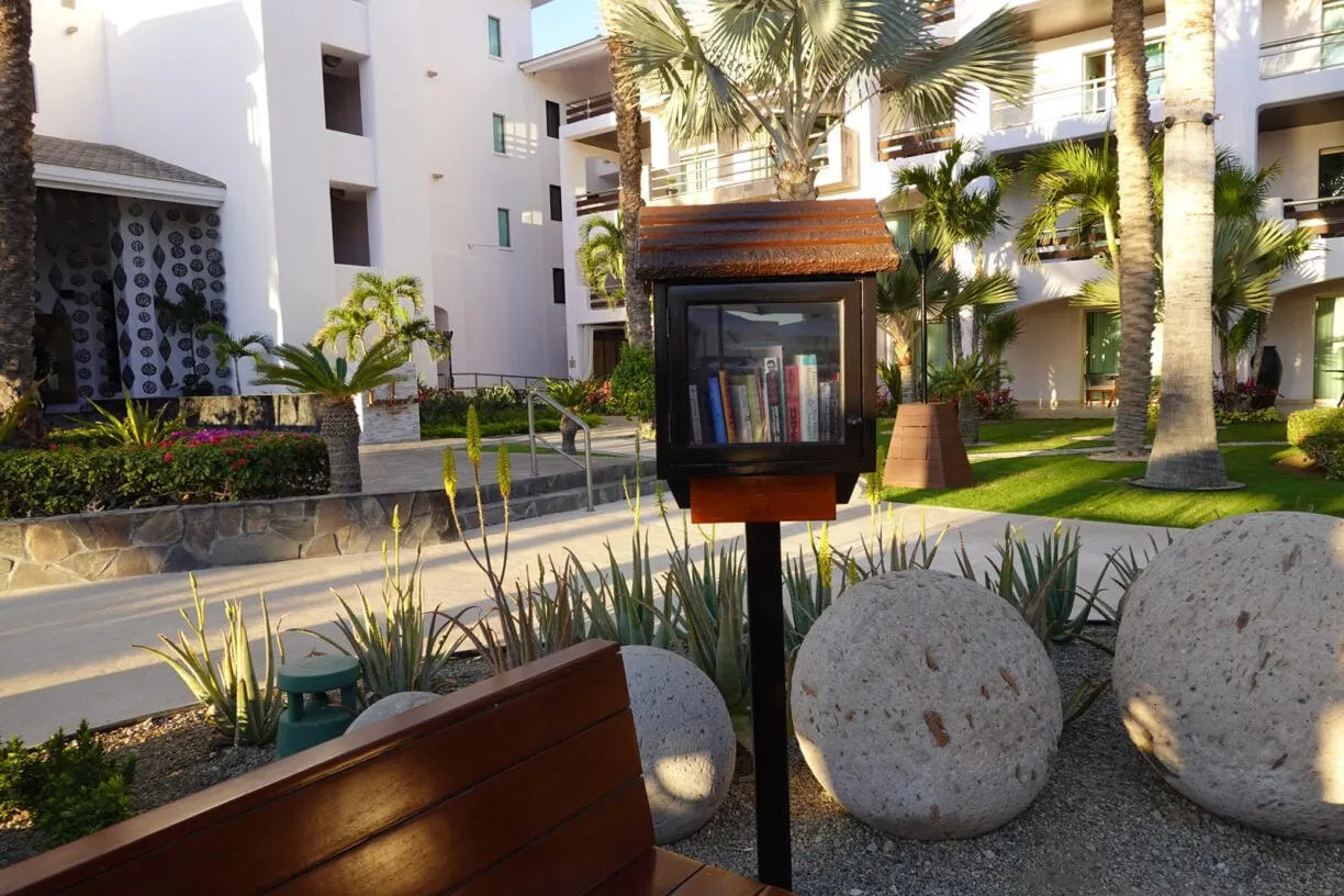 A little free library at a beach resort.