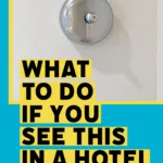 What the small silver round object in hotel room bathrooms is.