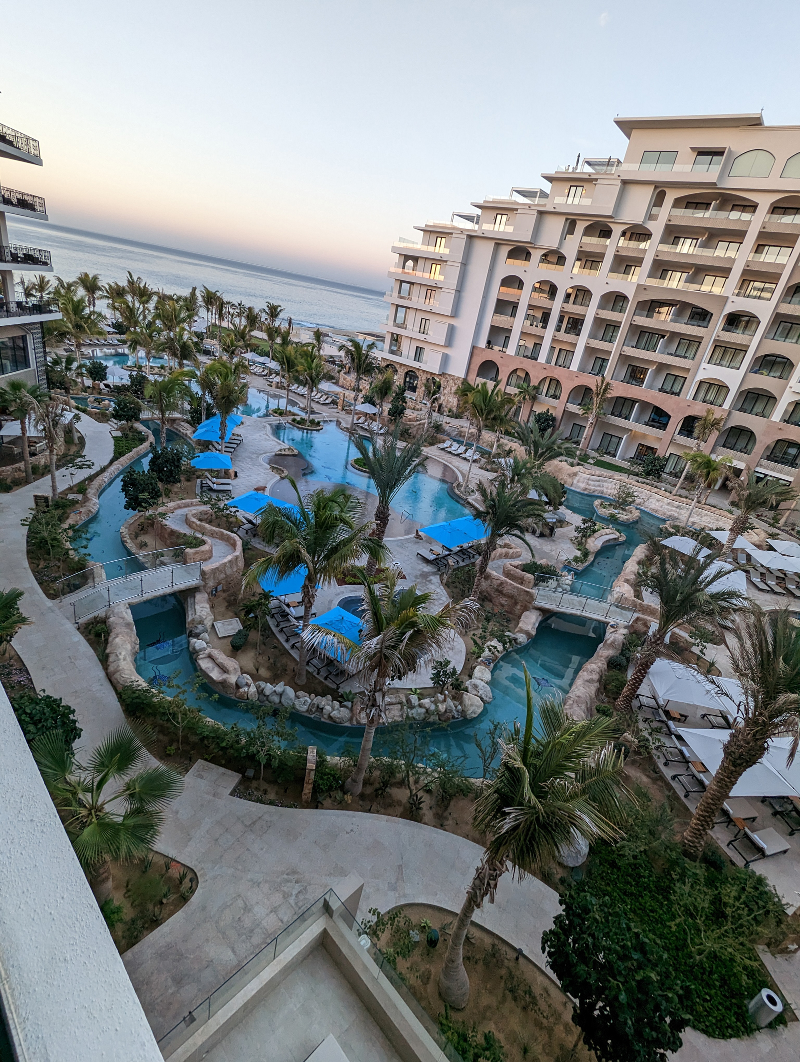 A lazy river winds along a resort property course in mexico.