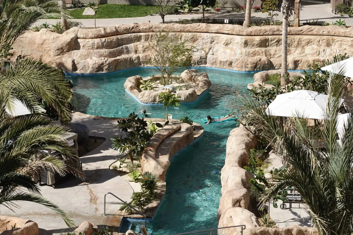 A person floating on a lazy river.