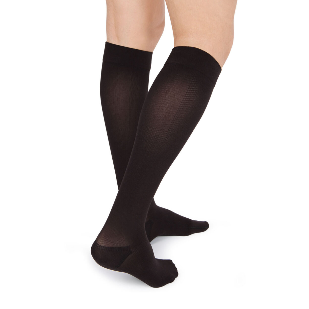 Traveler wearing black knee-high compression socks
