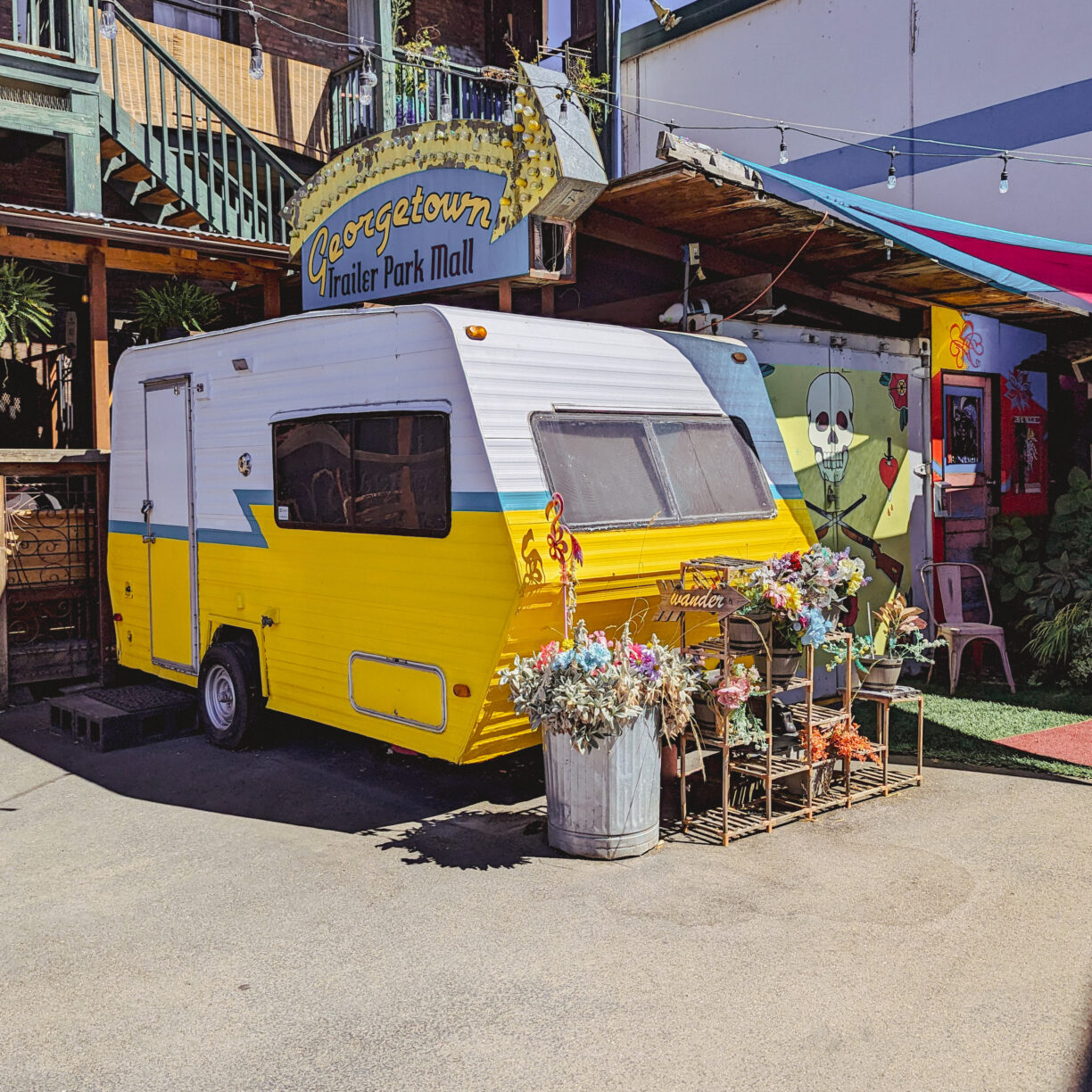 A row of campers and trailers that make up the georgetown trailer park.